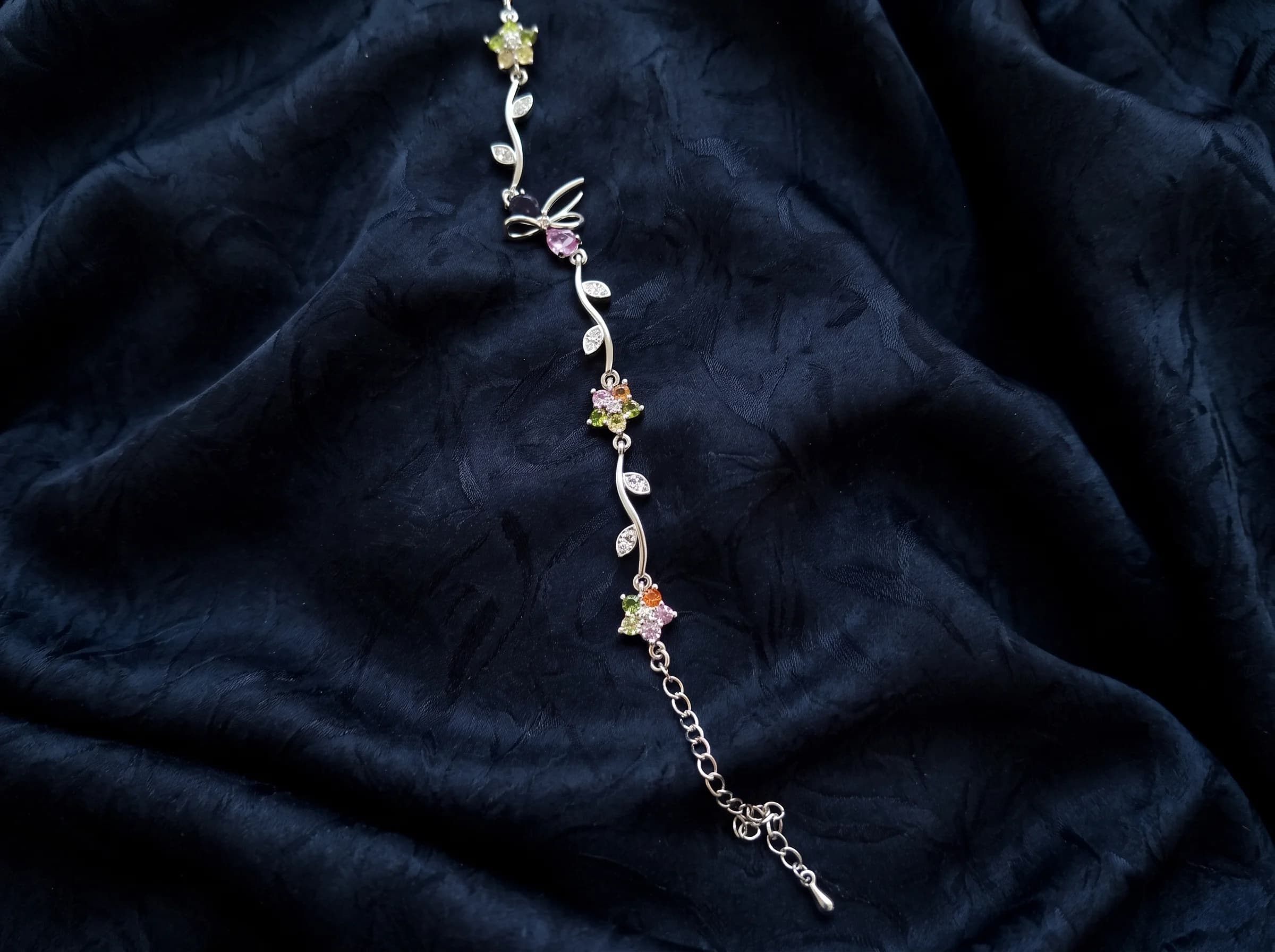 The Serenity delicate silver leafy vine bracelet with pastel crystal florets