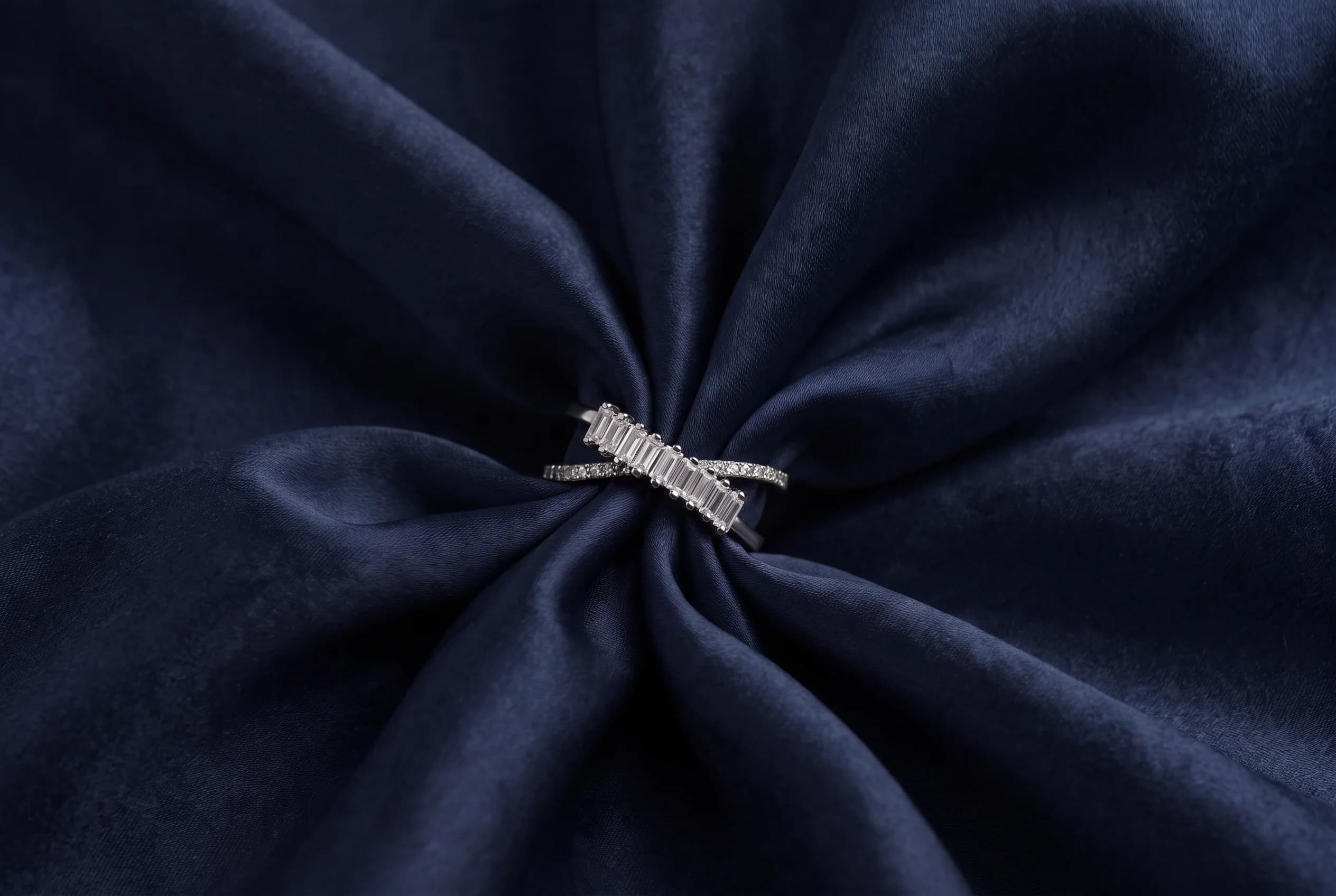 The Solace silver crossover band with baguette crystals and micro-pave